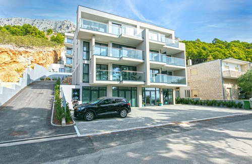 Brela Apartment | Two bedroom apartment with a swimming pool Brela, Makarska (A-19834-d)