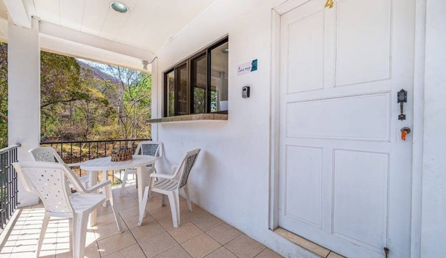 2 Bedroom Delightful second-floor apartment with modern amenities , WiFi & Pool