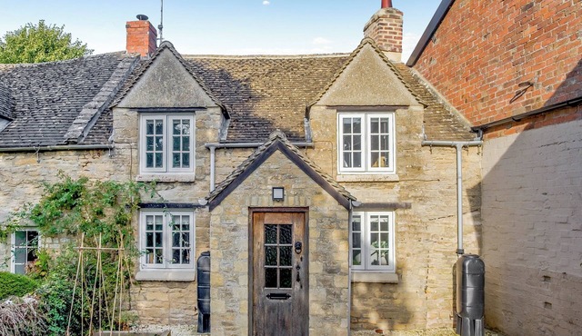 A charming and characterful Cotswold cottage in the heart of a quaint village.