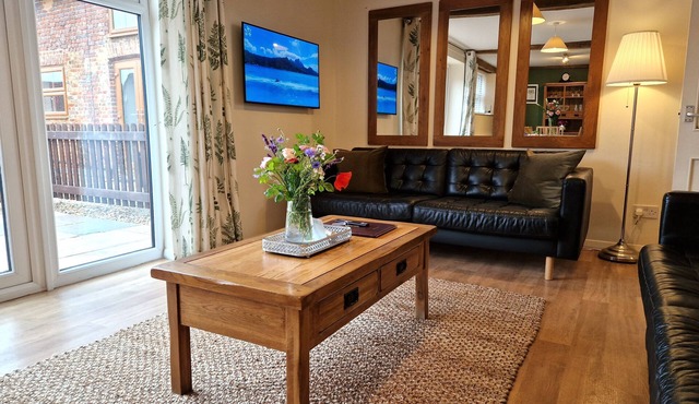 A thee bedroom, one bathroom that sleeps 5 guests in 3 bedrooms