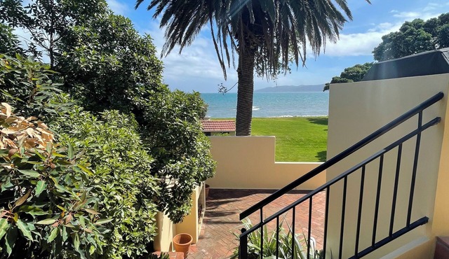 Absolute Beachfront Escape - Swim, Dine, Relax in Style
