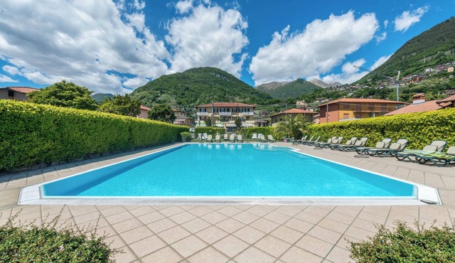 Apartment Bilocale with Pool, Wi-Fi, Balcony, Garden & Terrace