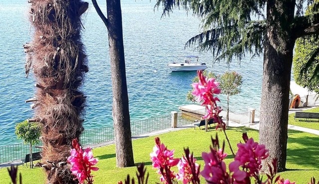 Appartamento direttamente a lago con spiaggia e pontili