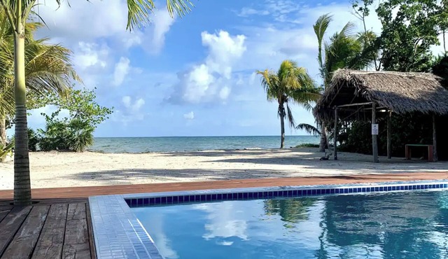 Beachfront Paradise: Pool, Volleyball & Rooftop