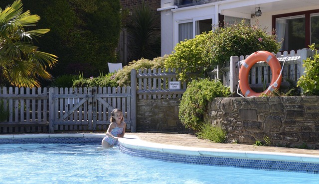 Beautiful family house with pool and views over golf course and South Downs