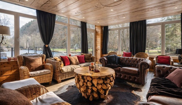 Beautiful waterfront house with heated indoor pool, sauna, terrace.