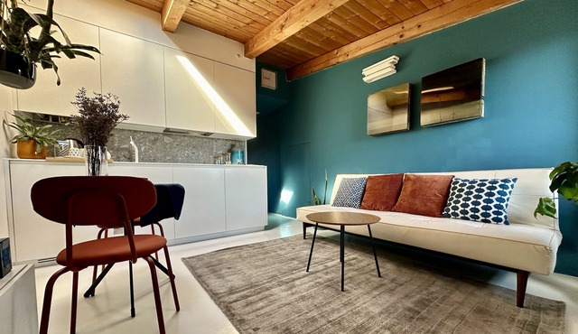 Bright apartment nestled in a green setting