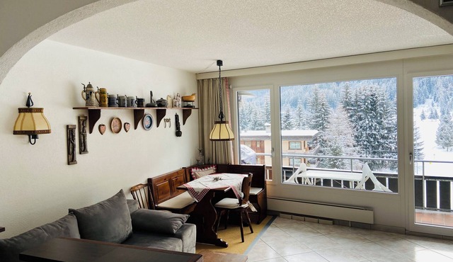 Central, cozy vacation apartment with pool near the cross-country ski trail, ski lifts, golf course