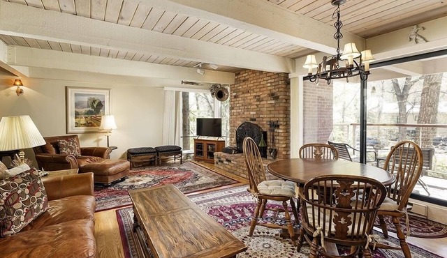 Chateau Eau Claire Unit 18 | Spacious Condo Overlooking the River with a Private Deck