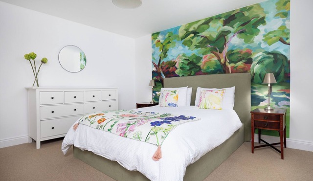 Countryside flat near Spalding by the river. Lovely walks & garden with pool.