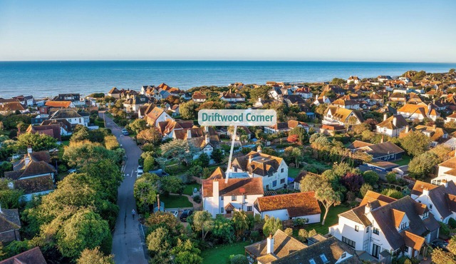 Family and dog friendly beach house with private parking and garden