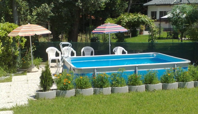 Holiday Apartment 'Laura' with Lake View, Pool, Wi-Fi & Garden