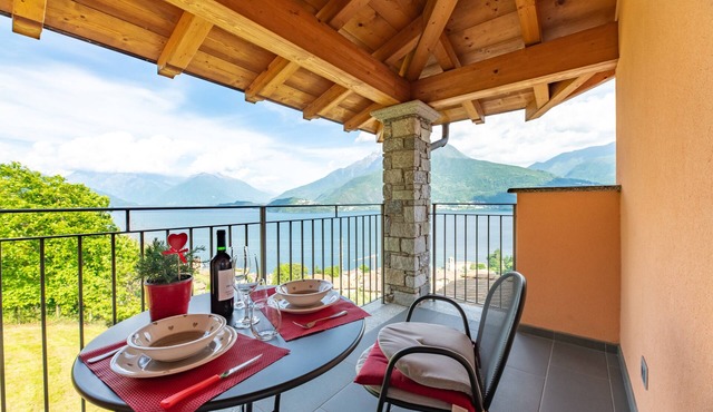 Holiday Apartment "Picolla Orchidea Finestra Sul Lago" with Private Terrace, Shared Pool & Wi-Fi