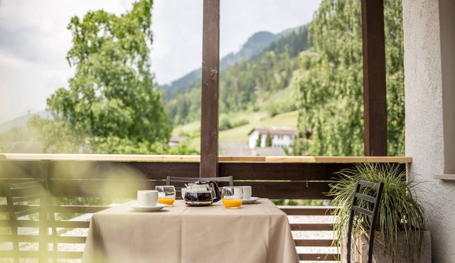 Holiday Apartment 'Pöder Alplahner' with Mountain View, Balcony, Shared Garden & Wi-Fi