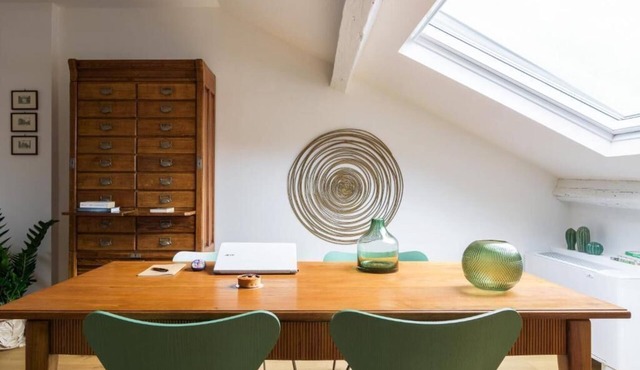 It is a newly renovated attic located in a building from the early 1900s
