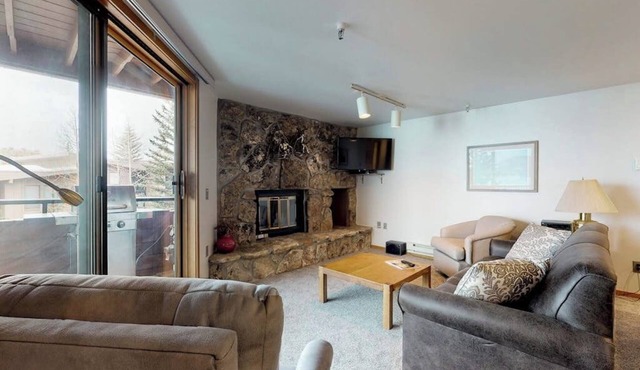 Lakefront Condo with Mountain Views & Shared Hot Tub - Walk to Town & Ski Access
