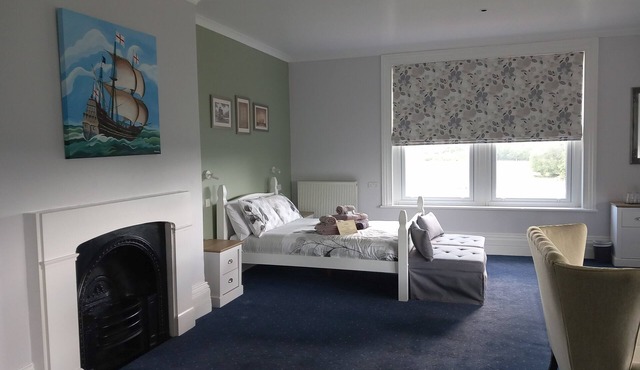Large En-suite Family Room with Double Aspect Scenic Views