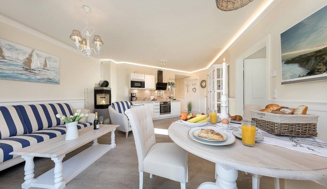 Luxury vacation apartment right by the sea with sauna and fireplace.