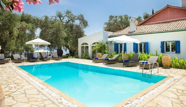 Majestic Beach Front Villa, 10 mins walk to Barbati Village, A/C, Private Pool, Sea Front Patios!