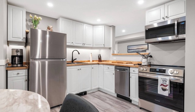 Newly renovated 2 bedroom 1 bath, dog friendly place with a hot tub, bbq, 3 TVs.