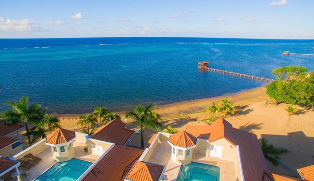 Oceanfront condo with private rooftop pool in gated community