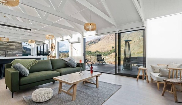 Riverfront Chateau with Stunning Mountain Views