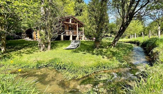 Romantic chalet with a hot tub and a steam room