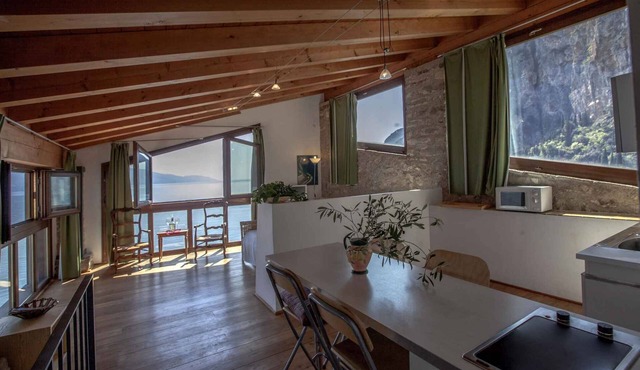 Rustically furnished studio with lake view and terrace