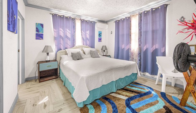 Spacious 4-bedroom house in Jackmans with AC