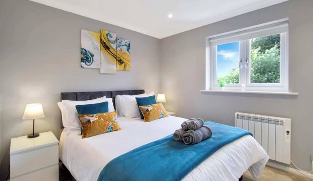 Spotless Two-Bedroom Home with Garden and Parking