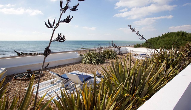 Stunning beach front property with sea views and hot tub featured in Tatler