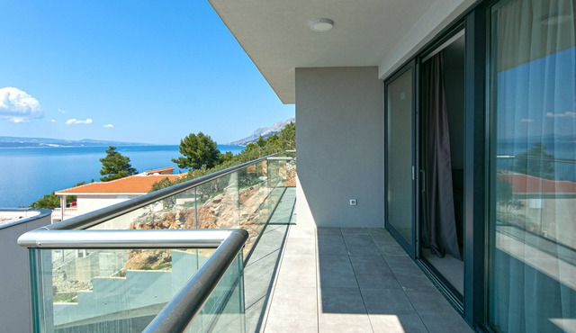 Two bedroom apartment with a swimming pool Brela, Makarska (A-20229-c)
