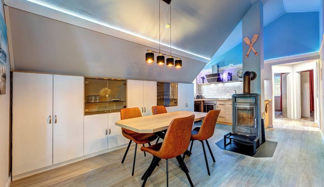 Vacation apartment with private sauna and fireplace, right on the beach.