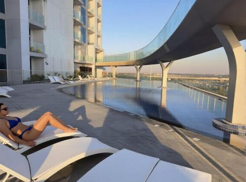 Vogue Vacation Homes, Arjan Skyz by Danube near Miracle Garden, One Bedroom Apartment with Balcony and City View, Access to all Amenities