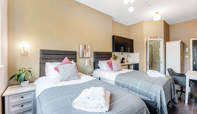 Wake, Sip, Slay – Stylish Studio with Cozy Feels