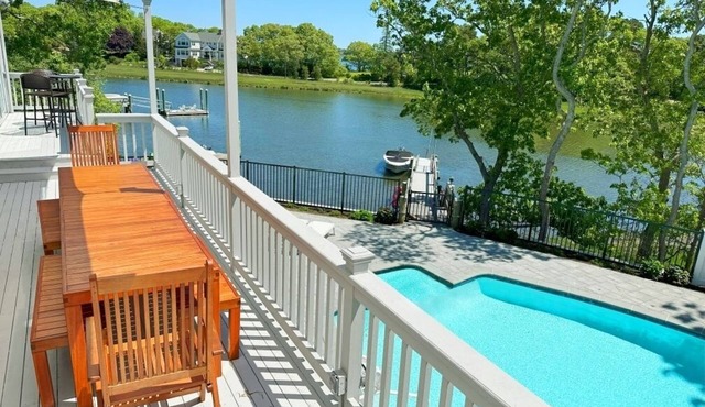 Waterfront home with private boat dock, heated pool, kayaks, A/C, and more