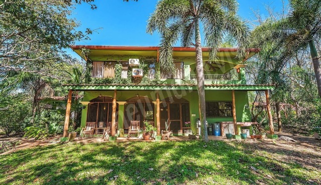 Welcome to Casa Verde, where Costa Rica doesn't just surround you — it becomes part of your everyday. This one-of-a-kind home is tucked inside Tierra Pacífica, a beautiful residential community that gives you the privacy of a jungle retreat with the