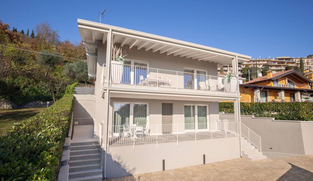 White Apartment with Terrace and Lake View