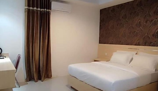 Wisma Sidapore teluk bayur Salakan